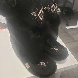 Size 9 women's  black mukaluks. Brand new